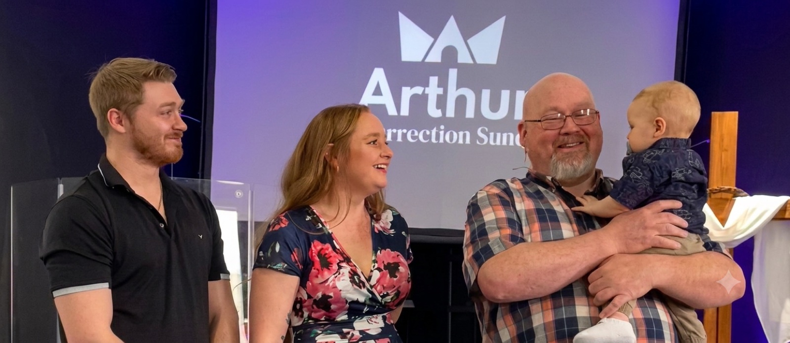 A family being welcomed at Arthur Pentecostal Assembly
